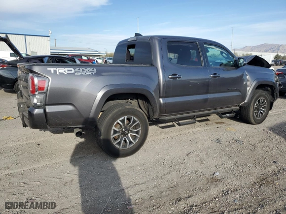 2021 Toyota Tacoma 4WD SR with VIN 5TFCZ5AN1MX271656, listed as a Copart auction lot 48734465 with 23,172 mi miles and Salvage Title. Bid and sale history available at carsss.com. Image 3.