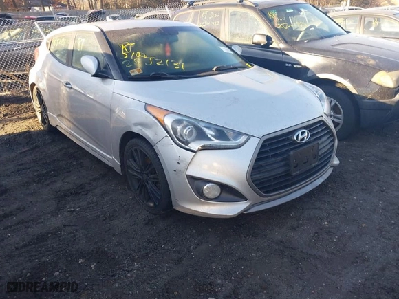 2016 Hyundai Veloster Turbo with VIN KMHTC6AE7GU264753, listed as a IAAI auction lot 41699222 with 999,999 mi miles. Bid and sale history available at carsss.com. Image 1.