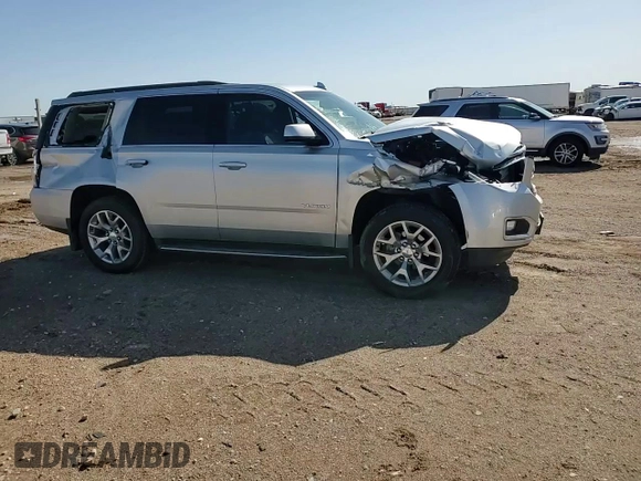 2017 GMC Yukon SLT with VIN 1GKS2BKC9HR345688, listed as a Copart auction lot 52303075 with 122,969 mi miles and Salvage Title. Bid and sale history available at carsss.com. Image 11.