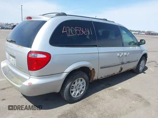 2003 Dodge Grand Caravan with VIN 2D4GP44303R281610, listed as a IAAI auction lot 42053641 with 196,877 mi miles and . Bid and sale history available at DreamBid. Image 4.