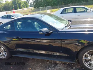 2015 Ford Mustang EcoBoost z VIN 1FA6P8TH3F5353923, wystawiony jako IAAI lot #42182603 z przebiegiem 86 599 mil mil oraz . Historia ofert i sprzedaży dostępna na DreamBid. Obrazek 13.