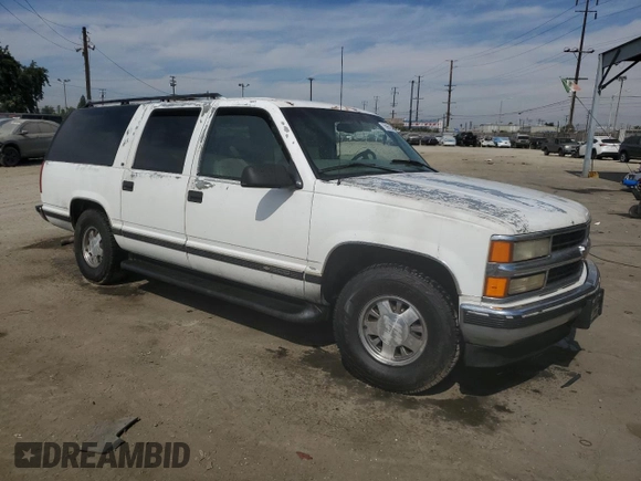 1997 Chevrolet Suburban with VIN 1GNEC16R5VJ301591, listed as a Copart auction lot 75965054 with 213,321 mi miles and Salvage Title. Bid and sale history available at carsss.com. Image 4.