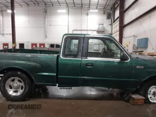 1999 Mazda B-Series Truck SE z VIN 4F4YR16C0XTM43278, wystawiony jako IAAI lot #41687429 z przebiegiem 288 858 mil mil oraz . Historia ofert i sprzedaży dostępna na DreamBid. Obrazek 13.