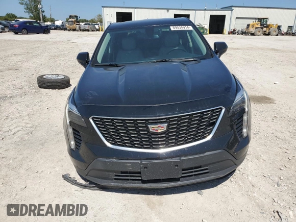 2019 Cadillac XT4 AWD Luxury with VIN 1GYFZBR45KF102731, listed as a Copart auction lot 69534914 with 76,078 mi miles and Salvage Title. Bid and sale history available at carsss.com. Image 5.