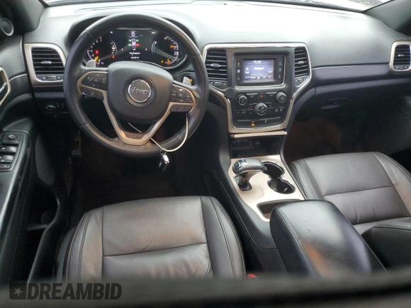 2014 Jeep Grand Cherokee Laredo with VIN 1C4RJEAGXEC130094, listed as a Copart auction lot 55997925 with 151,407 mi miles and Salvage Title. Bid and sale history available at DreamBid. Image 8.