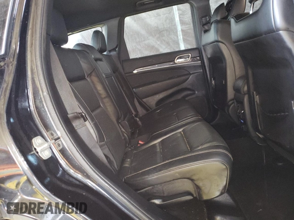 2015 Jeep Grand Cherokee Overland with VIN 1C4RJFCG8FC653117, listed as a Copart auction lot 49254595 with 142,359 mi miles and Clean Title. Bid and sale history available at carsss.com. Image 11.