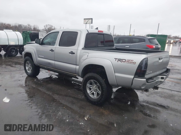2014 Toyota Tacoma with VIN 3TMLU4EN2EM161239, listed as a IAAI auction lot 41536944 with 136,299 mi miles. Bid and sale history available at carsss.com. Image 3.
