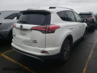 2016 Toyota RAV4 Hybrid XLE with VIN JTMRJREV7GD051091, listed as a Copart auction lot 73675162 with 168,832 mi miles. Bid and sale history available at carsss.com. Image 3.