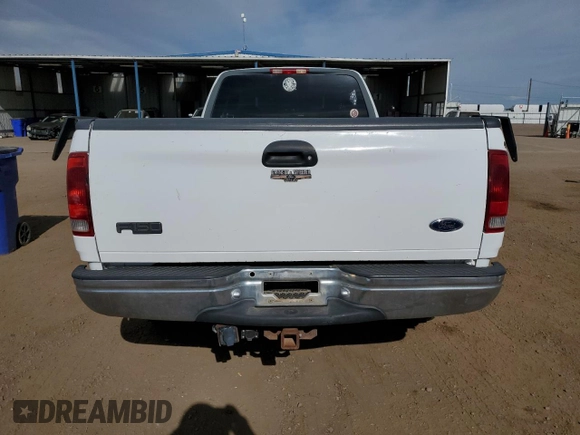 1999 Ford F-150 with VIN 2FTRX17L0XCA37979, listed as a Copart auction lot 58216695 with 256,055 mi miles and Clean title. Bid and sale history available at DreamBid. Image 6.