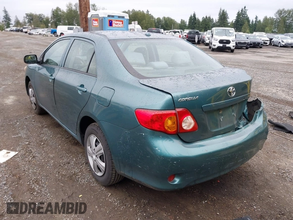 2010 Toyota Corolla with VIN 1NXBU4EE3AZ165944, listed as a IAAI auction lot 42597459 with 211,824 mi miles and . Bid and sale history available at DreamBid. Image 3.