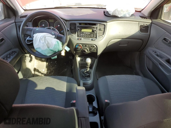 2009 Kia Rio LX with VIN KNADE243596567394, listed as a Copart auction lot 42240065 with 160,044 mi miles and Salvage Title. Bid and sale history available at carsss.com. Image 8.