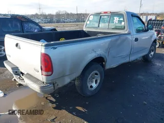 2001 Ford F-150 XL with VIN 1FTZF17201NB45630, listed as a IAAI auction lot 41456984 with 218,331 mi miles and . Bid and sale history available at DreamBid. Image 4.