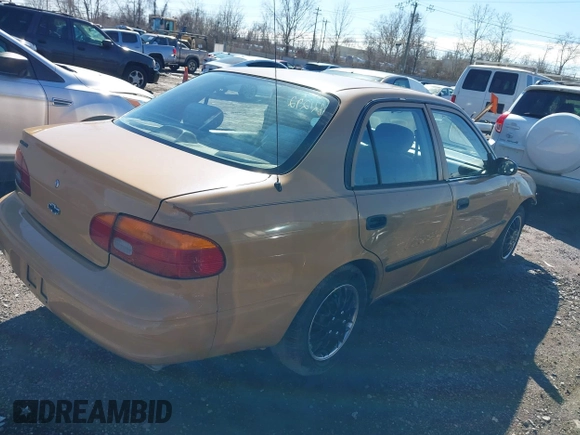 1999 Chevrolet Prizm z VIN 1Y1SK5284XZ400907, wystawiony jako IAAI lot #41821292 z przebiegiem 90 134 mil mil oraz . Historia ofert i sprzedaży dostępna na DreamBid. Obrazek 4.
