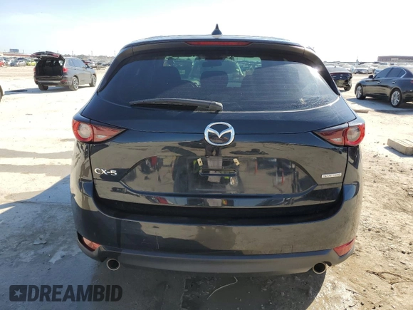2020 Mazda CX-5 Sport with VIN JM3KFABM9L0729042, listed as a Copart auction lot 46681065 with 34,595 mi miles and Salvage Title. Bid and sale history available at carsss.com. Image 6.