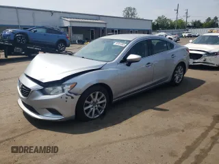 2016 Mazda 6 i Sport with VIN JM1GJ1U54G1412918, listed as a Copart auction lot 60081865 with 130,965 mi miles and Salvage title. Bid and sale history available at DreamBid. Image 1.