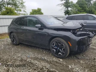 2022 BMW iX xDrive50 z VIN WB523CF08NCK28256, wystawiony jako Copart lot #58966325 z przebiegiem 20 721 mil mil oraz Szkoda całkowita • Salvage title. Historia ofert i sprzedaży dostępna na DreamBid. Obrazek 4.