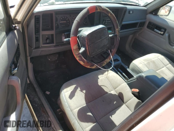 1996 Jeep Cherokee Sport with VIN 1J4FT68S4TL131956, listed as a Copart auction lot 74568064 with 174,014 mi miles and Non Repairable. Bid and sale history available at carsss.com. Image 8.