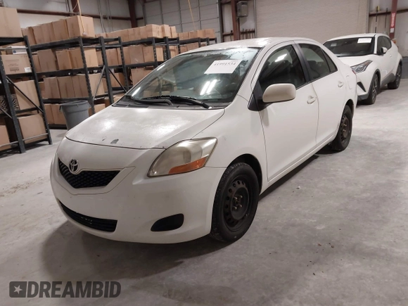 2009 Toyota Yaris with VIN JTDBT903994054207, listed as a IAAI auction lot 41991534 with 176,820 mi miles. Bid and sale history available at carsss.com. Image 2.