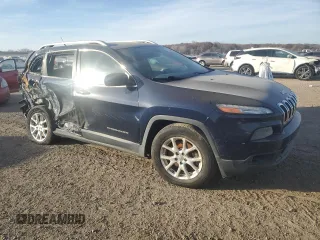 2014 Jeep Cherokee Latitude with VIN 1C4PJMCSXEW260457, listed as a Copart auction lot 76585553 with 84,957 mi miles and Salvage Title. Bid and sale history available at carsss.com. Image 4.