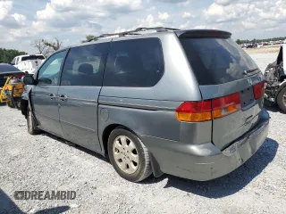 2002 Honda Odyssey EX-L with VIN 2HKRL18962H552809, listed as a Copart auction lot 63631115 with 224,019 mi miles and Salvage title. Bid and sale history available at DreamBid. Image 2.