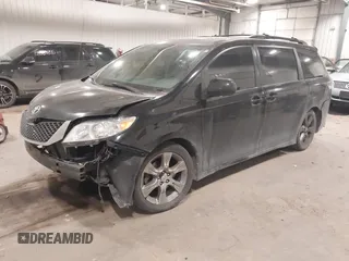 2011 Toyota Sienna SE with VIN 5TDXK3DC6BS112848, listed as a IAAI auction lot 41506859 with 298,533 mi miles. Bid and sale history available at carsss.com. Image 2.