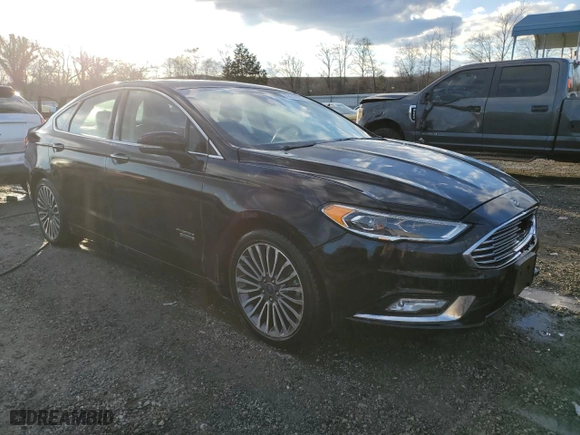 2017 Ford Fusion Energi Titanium with VIN 3FA6P0SU5HR201612, listed as a Copart auction lot 42618325 with 112,238 mi miles and Salvage Title. Bid and sale history available at carsss.com. Image 4.
