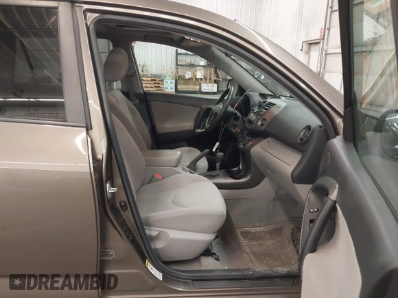 2011 Toyota RAV4 with VIN 2T3BF4DV8BW091196, listed as a IAAI auction lot 41870965 with 214,182 mi miles. Bid and sale history available at carsss.com. Image 5.