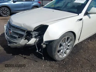 2009 Cadillac CTS AWD z VIN 1G6DT57V090104530, wystawiony jako IAAI lot #42314043 z przebiegiem 96 109 mil mil oraz . Historia ofert i sprzedaży dostępna na DreamBid. Obrazek 6.