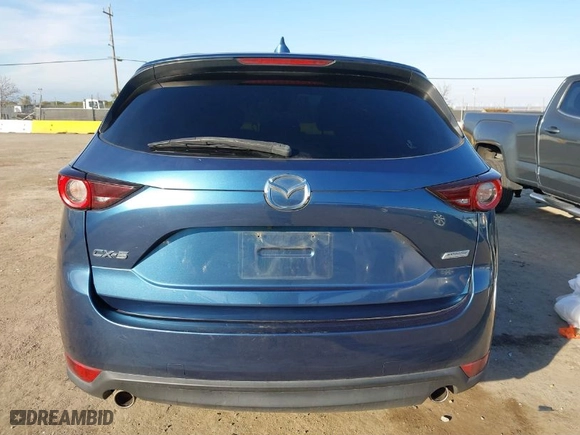 2019 Mazda CX-5 Touring with VIN JM3KFACM1K0517958, listed as a IAAI auction lot 41473681 with NaN miles. Bid and sale history available at carsss.com. Image 16.