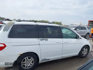 2007 Honda Odyssey Touring with VIN 5FNRL38887B081562, listed as a IAAI auction lot 42000435 with 238,287 mi miles and . Bid and sale history available at DreamBid. Image 14.