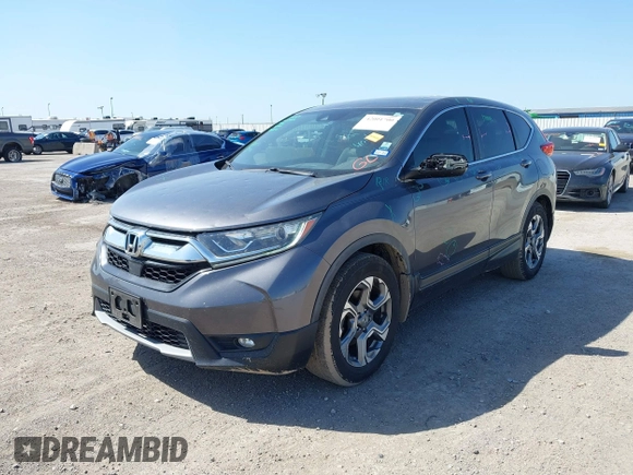 2019 Honda CR-V EX with VIN 5J6RW1H58KA042502, listed as a IAAI auction lot 42001700 with 117,396 mi miles and . Bid and sale history available at DreamBid. Image 17.