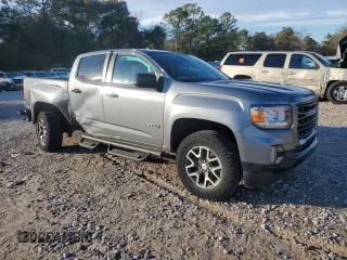 2021 GMC Canyon 4WD AT4 w/Leather with VIN 1GTG6FEN7M1156069, listed as a Copart auction lot 89345225 with 66,164 mi miles and Salvage Title. Bid and sale history available at carsss.com. Image 4.