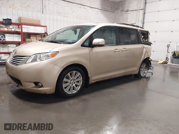 2014 Toyota Sienna Ltd with VIN 5TDDK3DCXES074614, listed as a IAAI auction lot 41691123 with 117,571 mi miles. Bid and sale history available at carsss.com. Image 2.