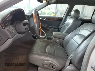 2004 Cadillac DeVille DTS z VIN 1G6KF57924U185324, wystawiony jako Copart lot #58222205 z przebiegiem 182 640 mil mil oraz Szkoda całkowita • Salvage title. Historia ofert i sprzedaży dostępna na DreamBid. Obrazek 7.