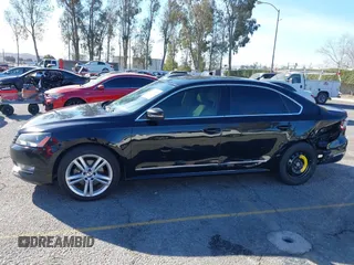 2015 Volkswagen Passat 2.0L TDI SEL Premium with VIN 1VWCV7A31FC053259, listed as a IAAI auction lot 41397357 with 157,842 mi miles. Bid and sale history available at carsss.com. Image 14.
