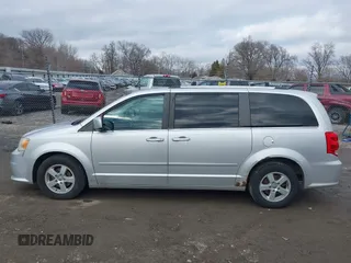 2011 Dodge Grand Caravan Crew with VIN 2D4RN5DG0BR751611, listed as a IAAI auction lot 41683889 with 181,551 mi miles and . Bid and sale history available at DreamBid. Image 14.
