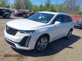 2023 Cadillac XT6 AWD Premium Luxury z VIN 1GYKPDRS4PZ182799, wystawiony jako IAAI lot #42161097 z przebiegiem 22 776 mil mil oraz . Historia ofert i sprzedaży dostępna na DreamBid. Obrazek 2.