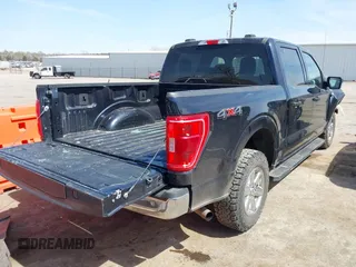 2021 Ford F-150 XL z VIN 1FTFW1E86MFB31305, wystawiony jako IAAI lot #41877501 z przebiegiem 140 285 mil mil oraz . Historia ofert i sprzedaży dostępna na DreamBid. Obrazek 4.
