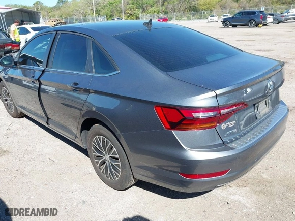 2019 Volkswagen Jetta SEL with VIN 3VWE57BUXKM242727, listed as a IAAI auction lot 41827327 with 91,898 mi miles. Bid and sale history available at carsss.com. Image 3.