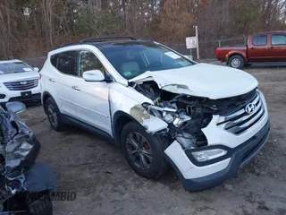 2014 Hyundai Santa Fe z VIN 5XYZUDLB4EG129473, wystawiony jako IAAI lot #40978108 z przebiegiem 169 997 mil mil oraz . Historia ofert i sprzedaży dostępna na DreamBid. Obrazek 1.