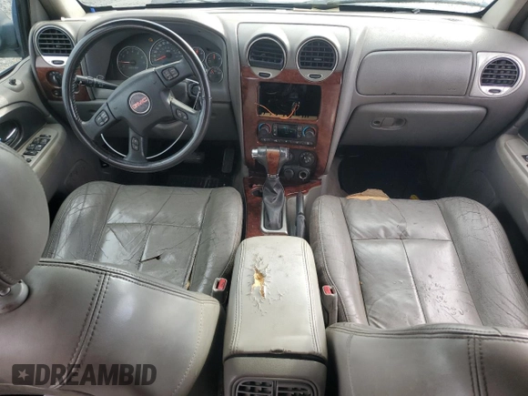 2005 GMC Envoy SLT with VIN 1GKDS13S852320018, listed as a Copart auction lot 80496544 with 237,451 mi miles and Salvage Title. Bid and sale history available at carsss.com. Image 8.