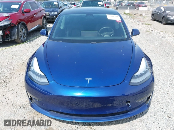 2021 Tesla Model 3 Performance with VIN 5YJ3E1EC1MF000961, listed as a IAAI auction lot 42110524 with 31,890 mi miles and . Bid and sale history available at carsss.com. Image 12.