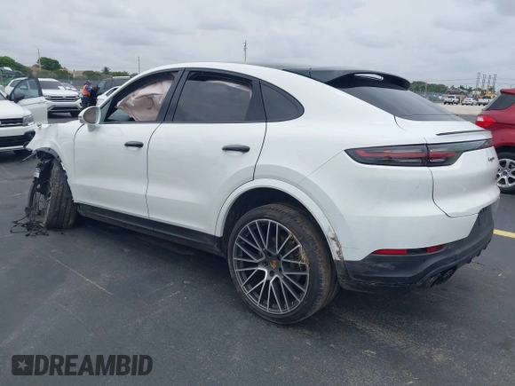 2023 Porsche Cayenne with VIN WP1BA2AY2PDA26896, listed as a IAAI auction lot 42434506 with 10,577 mi miles and . Bid and sale history available at DreamBid. Image 3.