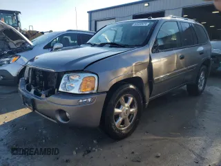 2005 GMC Envoy SLT with VIN 1GKDS13SX52322725, listed as a Copart auction lot 82032674 with 249,288 mi miles and Salvage Title. Bid and sale history available at carsss.com. Image 1.