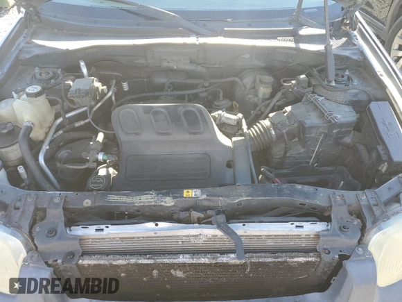 2004 Ford Escape XLS with VIN 1FMYU02184DA07091, listed as a Copart auction lot 84685754 with 212,257 mi miles and Salvage Title. Bid and sale history available at DreamBid. Image 12.