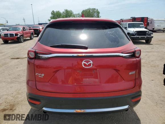 2017 Mazda CX-9 Grand Touring with VIN JM3TCBDY4H0138367, listed as a Copart auction lot 60852185 with 101,859 mi miles and Salvage title. Bid and sale history available at DreamBid. Image 6.