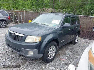 2008 Mazda Tribute Touring with VIN 4F2CZ02ZX8KM25983, listed as a IAAI auction lot 42122836 with 148,080 mi miles. Bid and sale history available at carsss.com. Image 2.