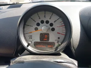 2014 MINI Countryman S with VIN WMWZC3C5XEWP27221, listed as a IAAI auction lot 41957817 with 112,353 mi miles and . Bid and sale history available at DreamBid. Image 7.