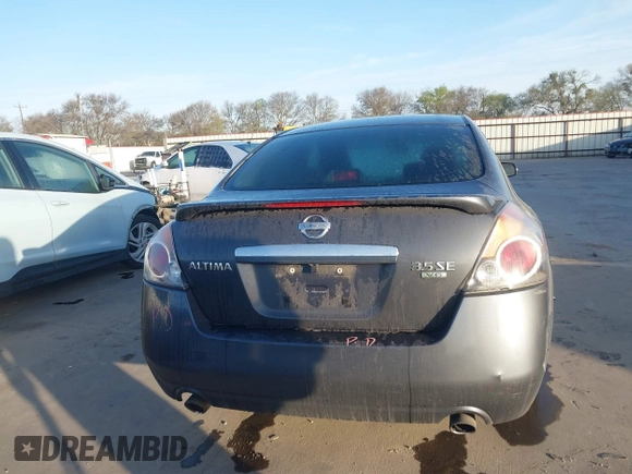 2008 Nissan Altima 3.5 SE with VIN 1N4BL21E18C236081, listed as a IAAI auction lot 41792229 with 136,208 mi miles. Bid and sale history available at carsss.com. Image 16.