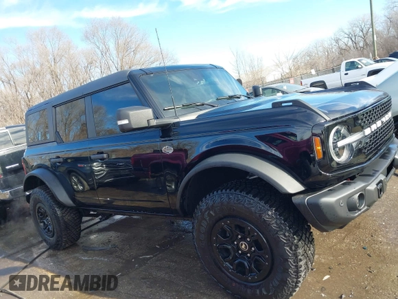 2023 Ford Bronco with VIN 1FMEE5DP9PLB82362, listed as a IAAI auction lot 41443809 with 13,567 mi miles and . Bid and sale history available at DreamBid. Image 13.